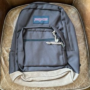New without tags. Jansport backpack. Brown. Suede leather bottom and pulls.